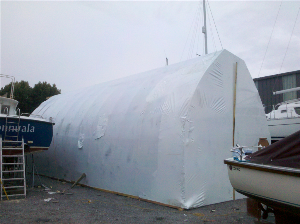 Bow roof shed as a temporary workshelter for renovation a boat in Valentia Island. We built the bow roof shed as well! Gallery Image