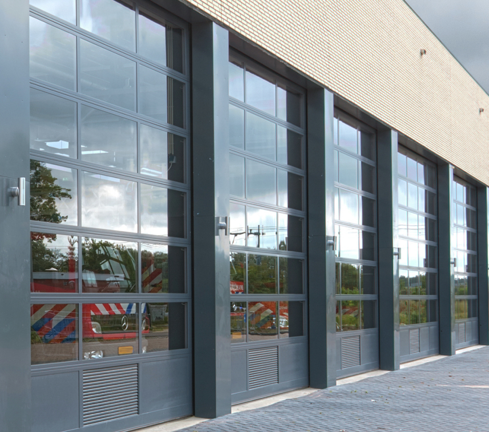 Glazed Industrial Doors - ideal for showrooms and fire/rescue stations Gallery Image