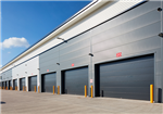 A row of level access overhead sectional doors Gallery Thumbnail