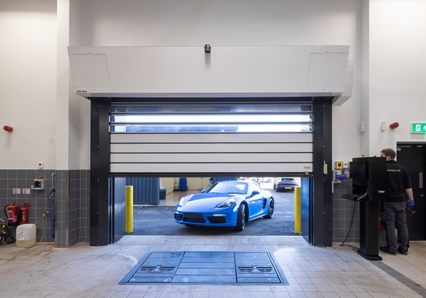 An RR3000 ISO external high speed door at a Porsche dealership  Gallery Image