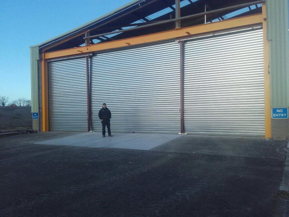Happy customer with his industrial 14m door. Gallery Image