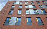  BBA-certified StoCleyer B mineral brick slips in a multi-blend red colour, the final finish for the externally insulated facade for this Riverside development. Gallery Thumbnail