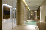 Glass screens and doors to basement plunge pool and sauna in Mayfair home. Gallery Thumbnail