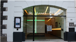 Award-winning design of arched glass doors set within black steel cross framing at St Anne's Church, Soho Gallery Thumbnail