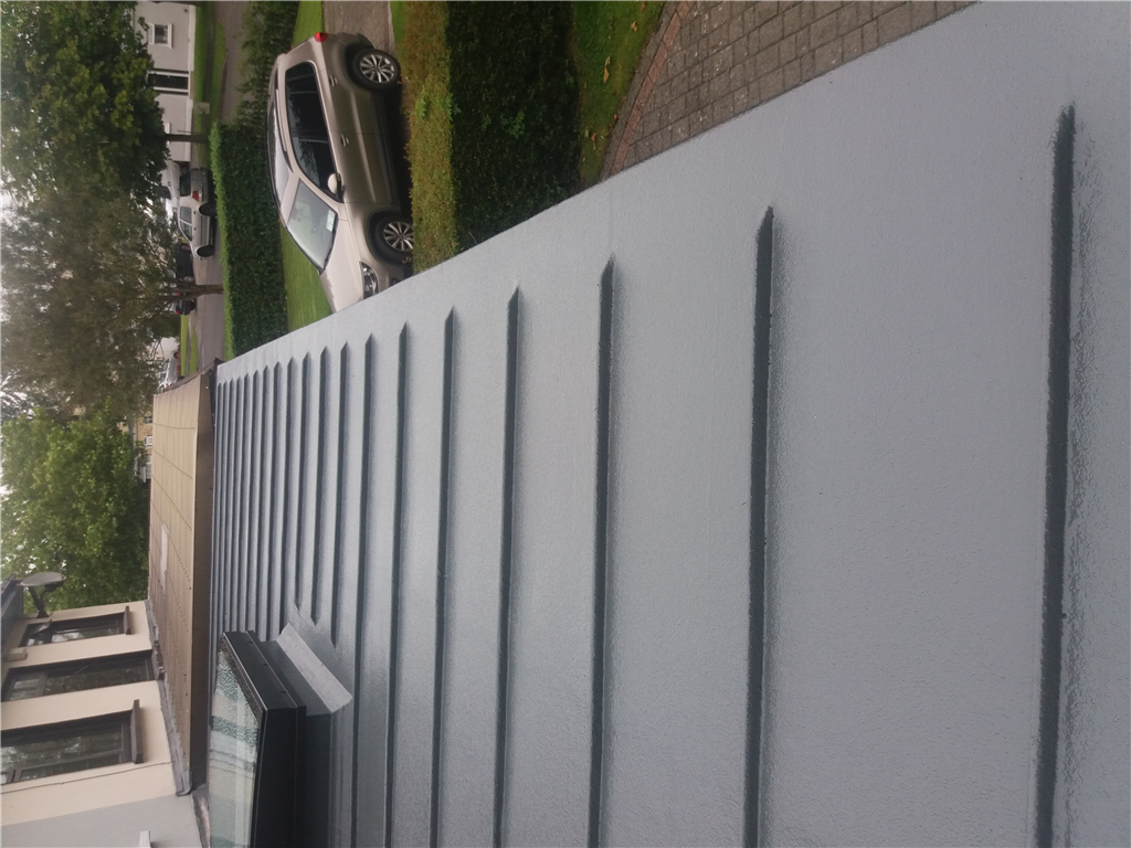 Fibreglass Roof with zinc effect ribs. Topcoated in basalt grey  Gallery Image
