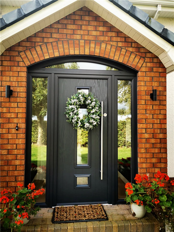 Modern composite door in anthracite grey with long bar handle Gallery Image