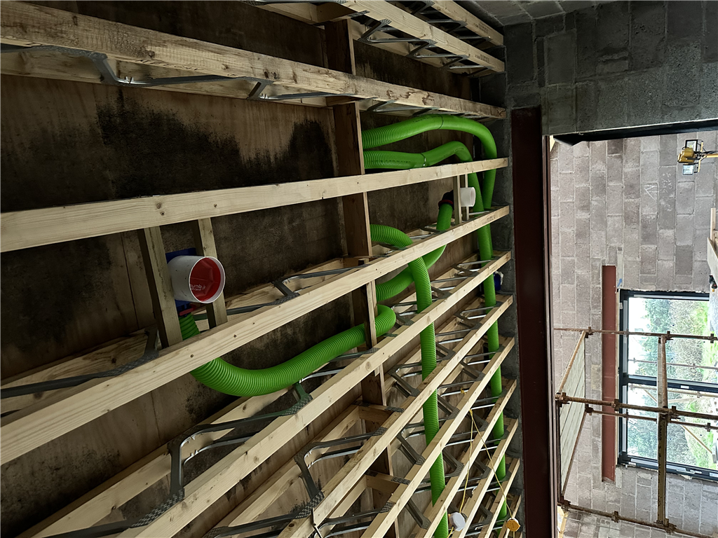 Plumbavent S90 ducting installed in a web joist system Gallery Image