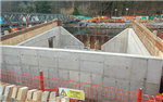 Pooley Bridge, England. 
Betts Construction formed the abutments within the cofferdams using the EFCO HAND-E-FORM system. These all-steel face sheets leave a single line. Gallery Thumbnail