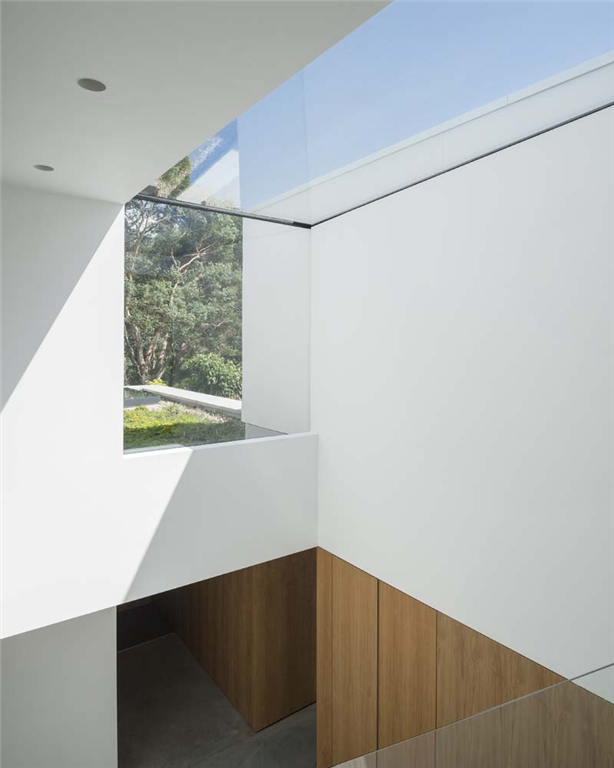 Bespoke eaves roofligh positioned within a stairwell, enabling light to flood into a typically dark, enclosed space Gallery Image