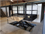Here we designed & Installed a goods lift to allow our client to load & unload pallets from a truck safely, this particular Scissor Table/ Goods Lift also allows a person to to travel on the lift. Gallery Thumbnail