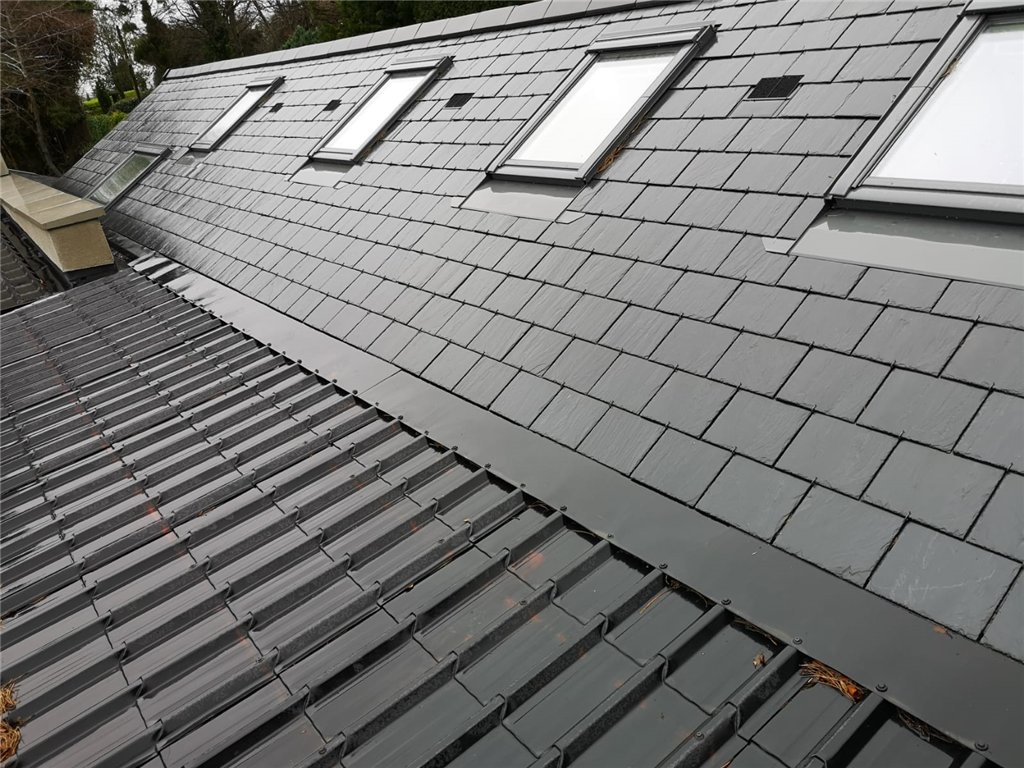Tile effect sheet with flashing onto existing slate roof Gallery Image