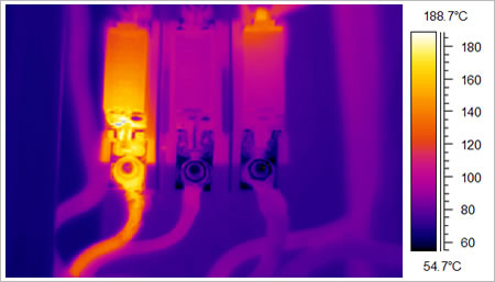 A Thermal Image Of A Fuse, Where One Of The Fuses (Hot Spot) Is Showing A Deficiency. The Naked Eye Could Not Detect This. Use Geo Therm Ltd To Help You Find Any Electrical Issues. Gallery Image
